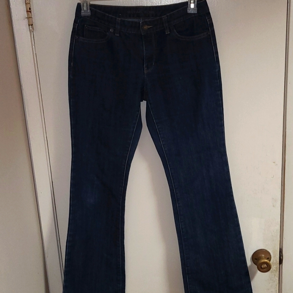 Micheal Kors dark wash boot leg jeans.